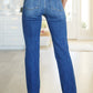 Josephine Mid Rise Raw Hem Bootcut Jeans