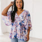 Fabled in Floral Draped Peplum Top in Blue