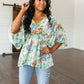 Fabled in Floral Draped Peplum Top in Ivory