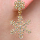 Falling Snowflake Earrings In Gold