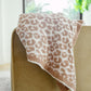 Fuzzy Feeling Blanket In Tan