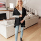 Knitted Fuzzy Pom Pom Scarf In Black