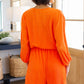 Roll With me Romper in Tangerine