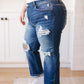 Suki Mid Rise Sequin Patch Tapered Jeans
